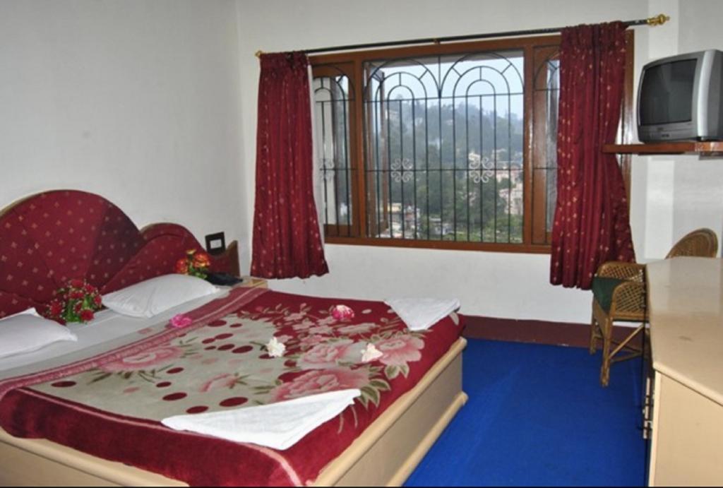 Hotel Ruby International Kodaikanal Rum bild